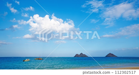 Boat, ocean and landscape of beach in Hawaii for tropical holiday, vacation and travel destination. Nature, island and seashore, waves and water in summer weekend for location, background and horizon 112302517