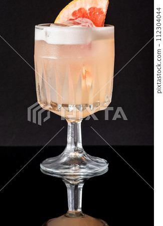 Grapefruit tequila sour cocktail Grapefruit tequila sour cocktail 112304044