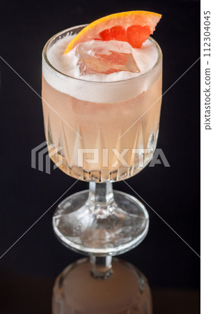 Grapefruit tequila sour cocktail Grapefruit tequila sour cocktail 112304045