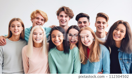 A group of multiracial young people, boys and girls, students of an educational institution smiling. A group of multiracial young people, boys and girls, students of an educational institution smiling. 112304502