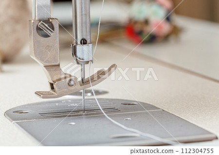 Sewing machine needle with thread and fabric Sewing machine needle with thread and fabric 112304755