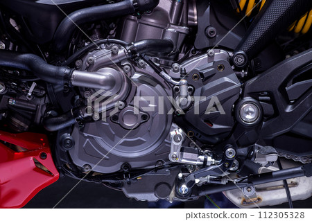 Close-up power engine of modern motorcycle Close-up power engine of modern motorcycle 112305328