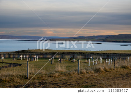 Small cemetery beside a fjord, Iceland 112305427