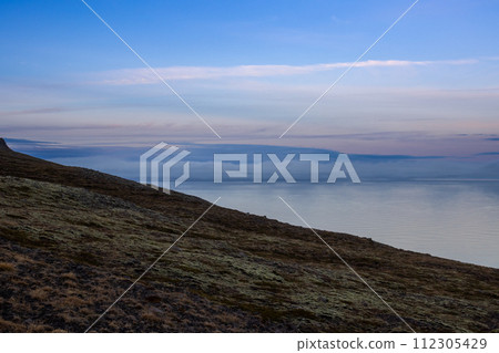 Evening fjord, mountains and sky, Iceland 112305429