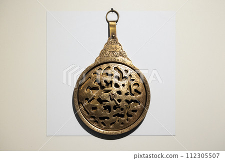 Antique Arabian astrolabe 18th-century is on white background 112305507