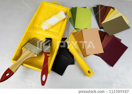 brushes on the background of paint samples 112305587