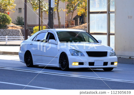 White sedan image 112305639