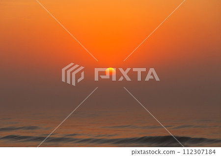 Beatiful red sunset over sea surface 112307184