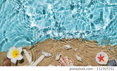Sea water, sand and seashells background. Summer beach. Summer background. 112307252
