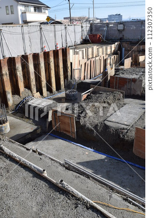 Building foundation construction site under construction Building foundation construction site under construction 112307350