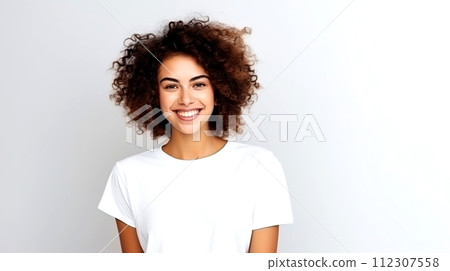 AI-generated content. Smiling young woman with curly brown hair in white t-shirt on gray background 112307558