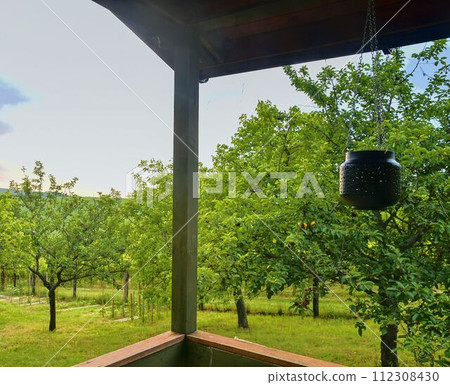 Small house cabin shed. Cute summer cabin in rural orchard. Close-up 112308430