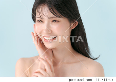 A woman taking care of her skin A woman taking care of her skin 112311803