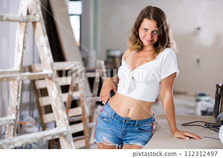 Sexy woman posing in building site 112312497