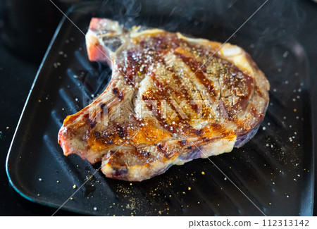 Beef entrecote fried in frying pan 112313142