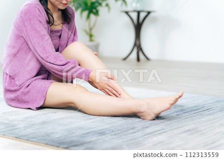 Image of female leg hair removal/massage Image of female leg hair removal/massage 112313559