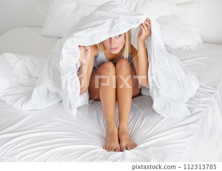 Morning, bed and woman hide with blanket for fear or anxiety in home and sheet to cover body. Nervous, girl and duvet over head of person with scary, nightmare and wake up in bedroom of apartment Morning, bed and woman hide with blanket for fear or anxiety in home and sheet to cover body. Nervous, girl and duvet over head of person with scary, nightmare and wake up in bedroom of apartment 112313785