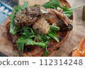 Open-faced oyster sandwich with oil 112314248
