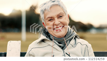 Face, senior woman and funny on park bench on vacation, holiday or travel in winter. Portrait, happy and elderly person in nature, outdoor or garden for laughing, freedom and retirement in Australia 112314259