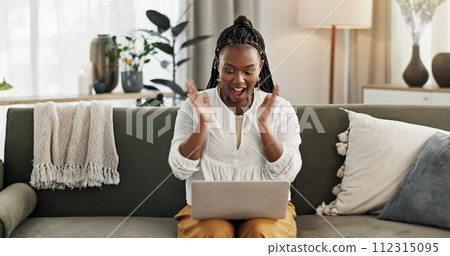 Black woman on sofa, surprise and celebration with laptop for remote work, social media or excited announcement. Happy girl on couch with computer for winning email, achievement and success in home. 112315095