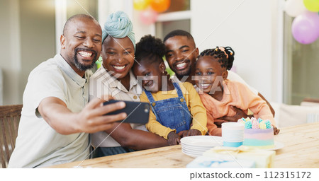Selfie, birthday and black family of children and parent together for bonding, love and care. African woman, man and happy kids at home for a picture, quality time and bonding or fun at a party Selfie, birthday and black family of children and parent together for bonding, love and care. African woman, man and happy kids at home for a picture, quality time and bonding or fun at a party 112315172