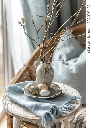 Rustic home decor with vase, branches, and speckled eggs. Perfect for interior design and lifestyle imagery. AI Generated. 112316402