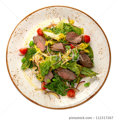 Isolated portion of roast beef salad with greens 112317267