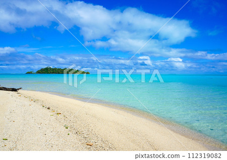 A deserted island with a beautiful sandy beach and a place where you can swim 112319082