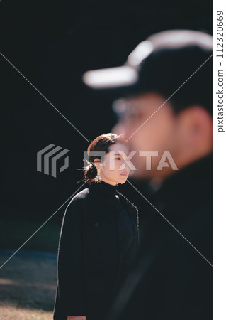 Men and women passing each other 112320669