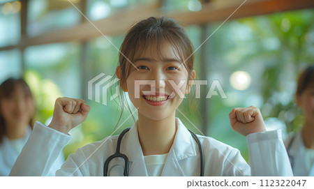 Young nurse team fist pumping 112322047