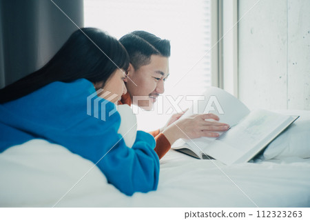 couple spending holiday in room 112323263