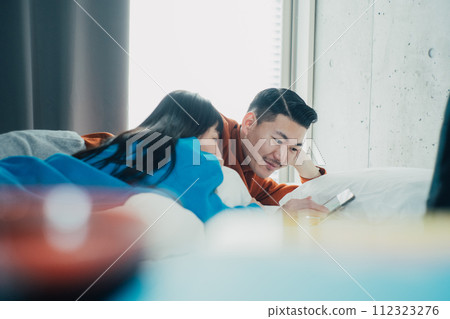 couple spending holiday in room couple spending holiday in room 112323276