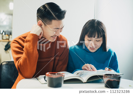 couple spending holiday in room couple spending holiday in room 112323286