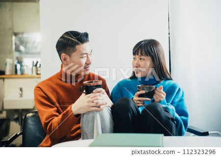 couple spending holiday in room couple spending holiday in room 112323296