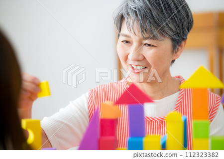 Nursery teacher Senior female Nursery teacher Senior female 112323382