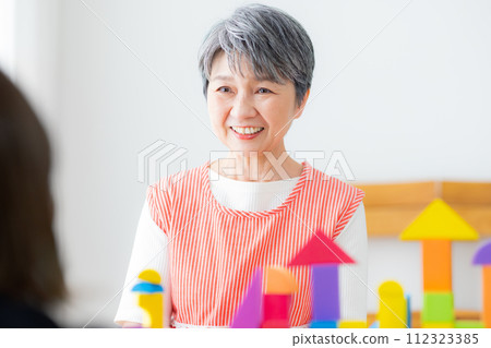 Nursery teacher Senior female Nursery teacher Senior female 112323385