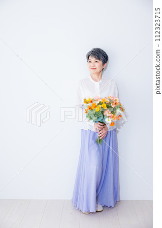 Senior women with flowers Senior women with flowers 112323715