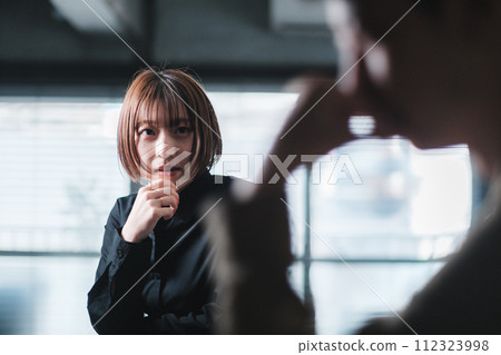 A man and a woman having a meeting in the office 112323998