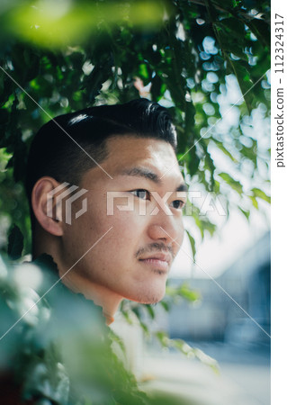 man wrapped in green 112324317