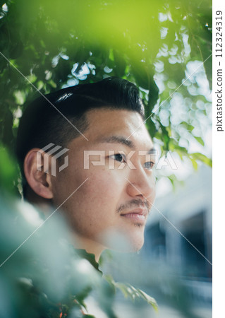 man wrapped in green 112324319