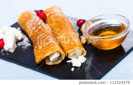 Bulgarian crepes Palatschinke on black board 112324379