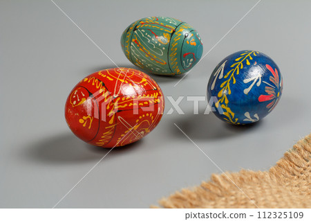 Painted Easter eggs and a sackcloth bag. 112325109