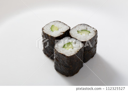 Japanese sushi, kappamaki, cucumber, and seaweed rolls photographed on a white background 112325527