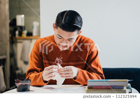 man taking care of glasses man taking care of glasses 112325994
