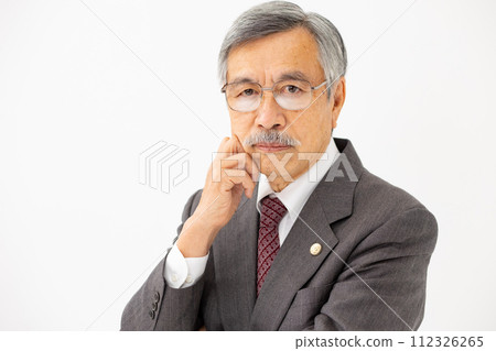 Senior male business thinking arms crossed Senior male business thinking arms crossed 112326265