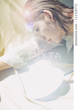 Woman portrait with light and shadow 112326772