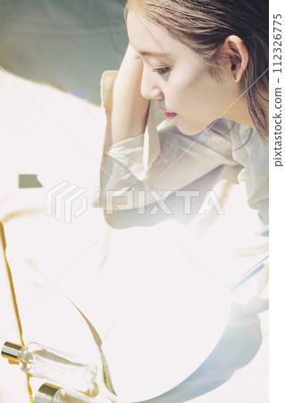 Woman portrait with light and shadow 112326775