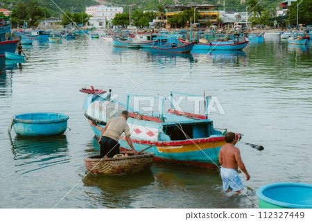 fisherman on boat 112327449