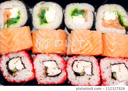 Bright beautiful rolls with fish close up Bright beautiful rolls with fish close up 112327826