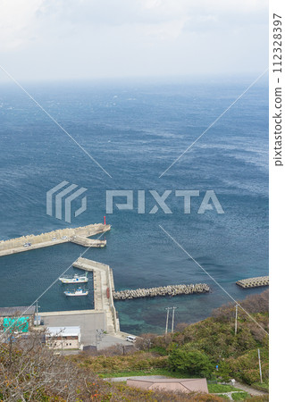 Japan: Tatsuhi Fishing Port and Tsugaru Strait in Tatsubisaki, Tsugaru Peninsula, Aomori Prefecture Japan: Tatsuhi Fishing Port and Tsugaru Strait in Tatsubisaki, Tsugaru Peninsula, Aomori Prefecture 112328397